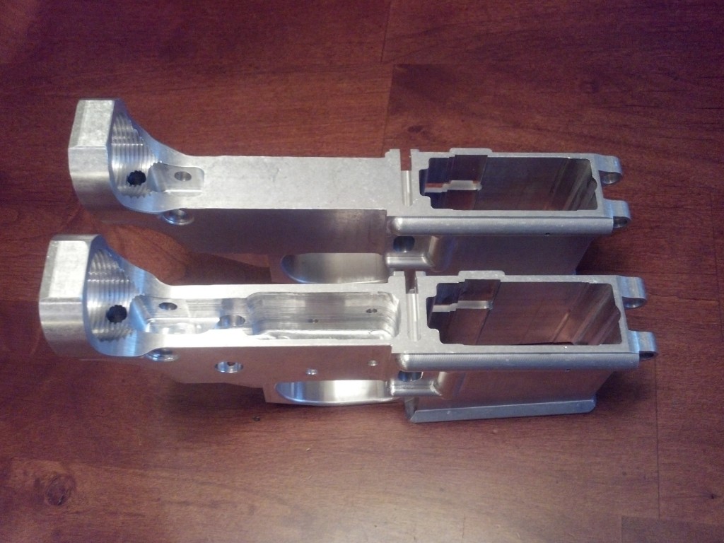 Two Lower Receivers. Top is 80% complete as purchased. Bottom has milling completed and ready for parts installation.