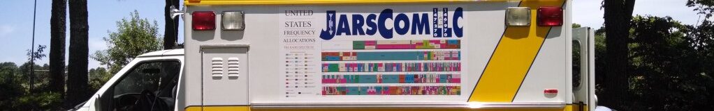 JarsComm mobile communications truck with US frequency allocations chart